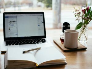 Computer with journal in front
